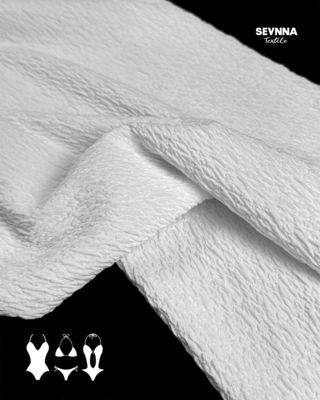 Трикотажное полотно двойной вязки жаккардового типа для прочных и универсальных текстильных изделий