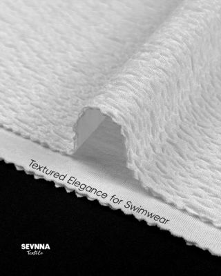 Трикотажное полотно двойной вязки жаккардового типа для прочных и универсальных текстильных изделий