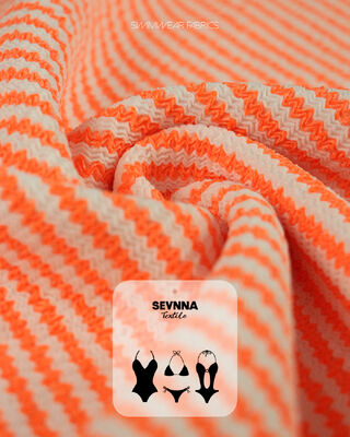 Премиальная текстурированная купальная ткань из 95% переработанного полиэстера + 5% спандекса, вес 280 грн и высокая проницаемость для купальных костюмов