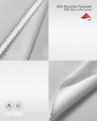 Ткань Lycra с 85% переработанным полиэстером, защитой от ультрафиолетовых лучей и удалением влаги для активных и купальных одежд